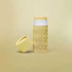 Load image into Gallery viewer, Front view of “Banana Yellow” NOZ Reef safe and Earth-friendly sunscreen cream 
